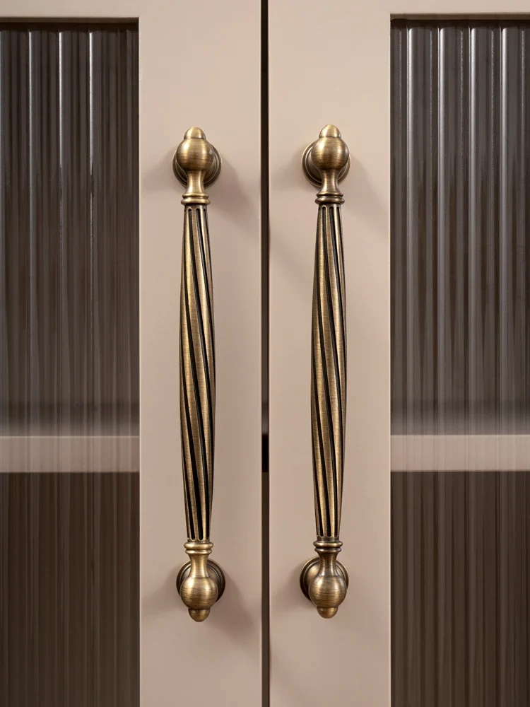 Poignée de meuble torsadée en laiton, effet bronze