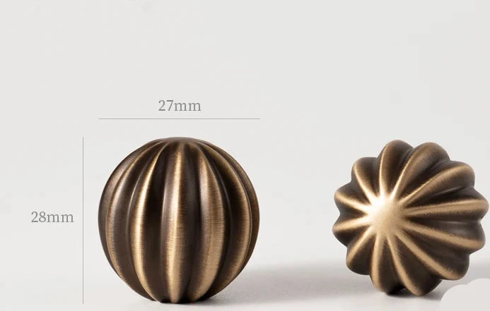 Poignée de meuble torsadée en laiton, effet bronze